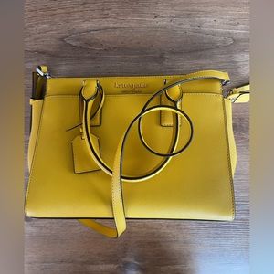 Authentic Kate Spade purse purchased at the outlet bright yellow gold color